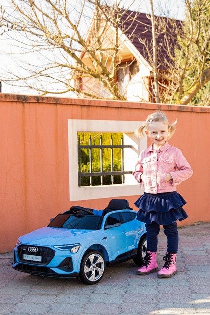 Electric ride-on car Audi E-tron Sportback 4x4 red, Artificial leather seat, 2.4 GHz remote control,