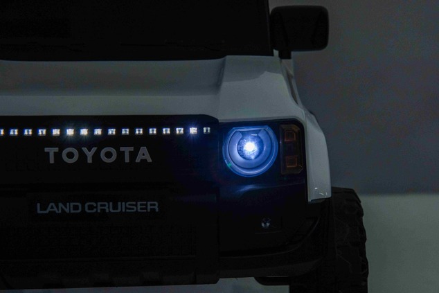 Electric ride-on car Toyota Landcruiser 12V, white, wide single seat, 2.4 GHz remote control, USB / 