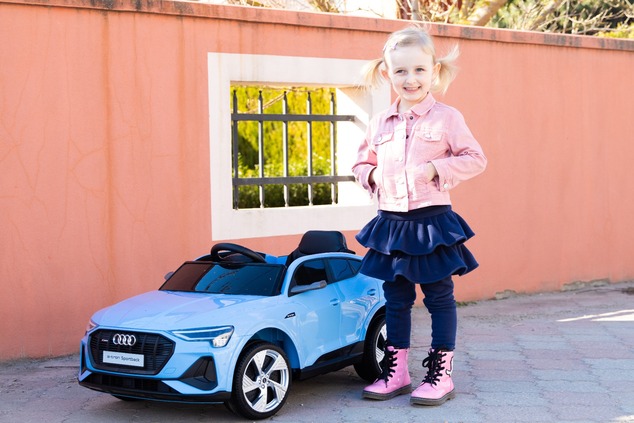Electric ride-on car Audi E-tron Sportback 4x4 red, Artificial leather seat, 2.4 GHz remote control,