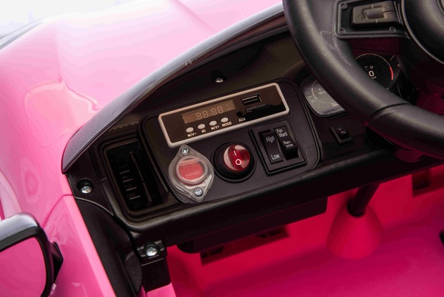 Auto elettrica per bambini Porsche Cayenne 12V con trazione posteriore - con licenza (1 posto), rosa